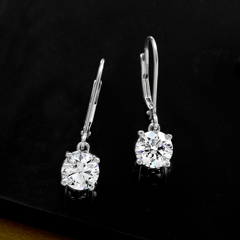 Platinum leverback diamond drop earrings with round stones, side view