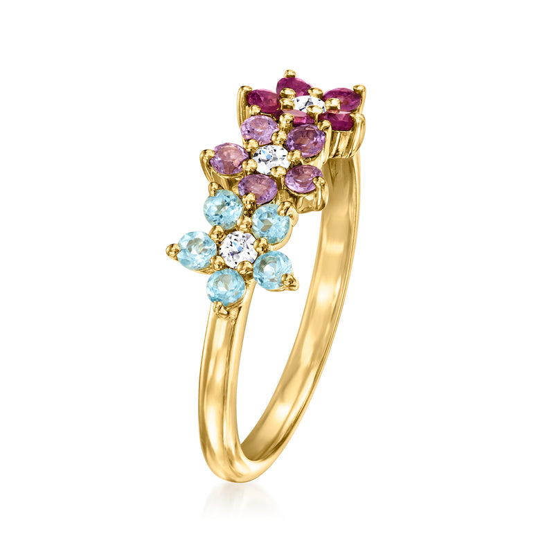 Gold multi-gemstone floral ring with purple and light blue stones and clear diamond accents