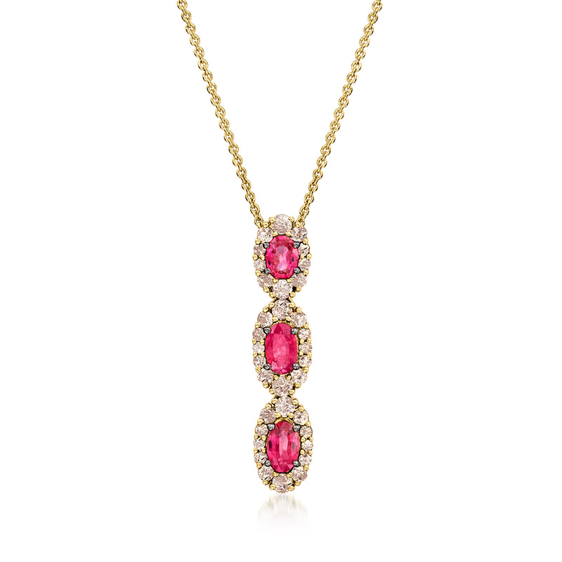14kt honey gold pendant necklace with three oval pink gemstones and diamond halos