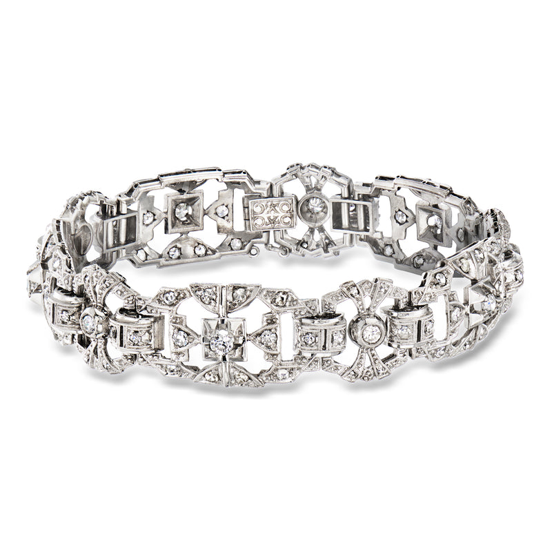 Vintage platinum diamond bracelet with geometric square and oval link settings