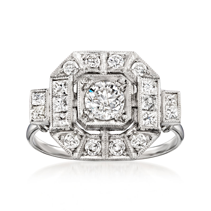 Geometric diamond ring in platinum with square-set halo and round center stone