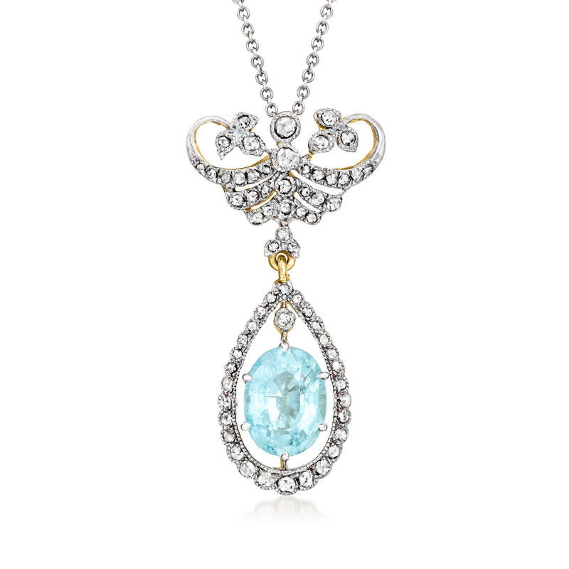 Two-tone teardrop aquamarine pendant necklace with diamond accents and silver chain