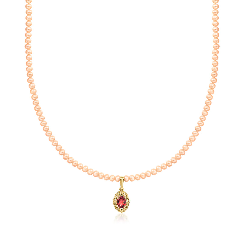 Peach cultured pearl necklace with 14kt yellow gold garnet pendant