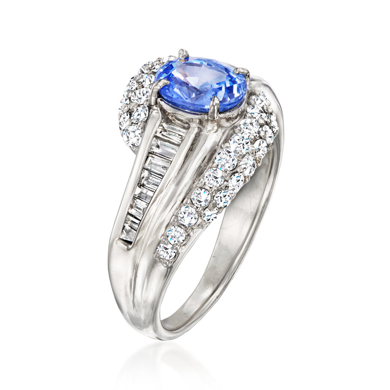 Platinum sapphire ring with diamond accents and split shank