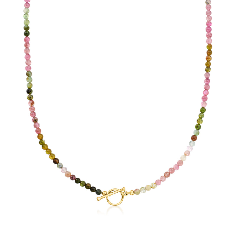 Multicolored tourmaline bead necklace with gold toggle clasp, no extra charms visible.