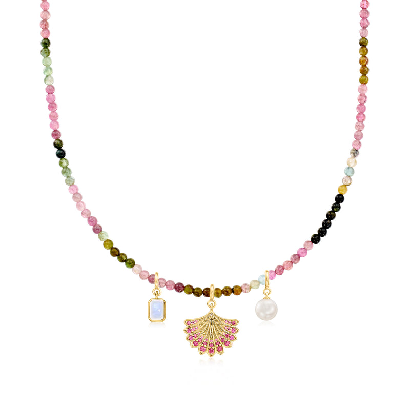 Multicolored tourmaline bead necklace with gold toggle clasp and fan, square, and pearl charms.