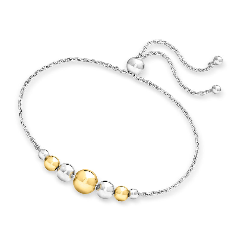Graduated gold and silver round beads on sterling silver bolo bracelet with loop ends