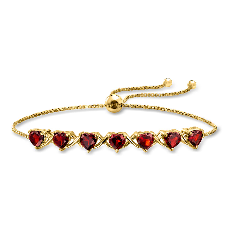 Gold bolo bracelet with row of heart-shaped red garnet stones and adjustable end beads