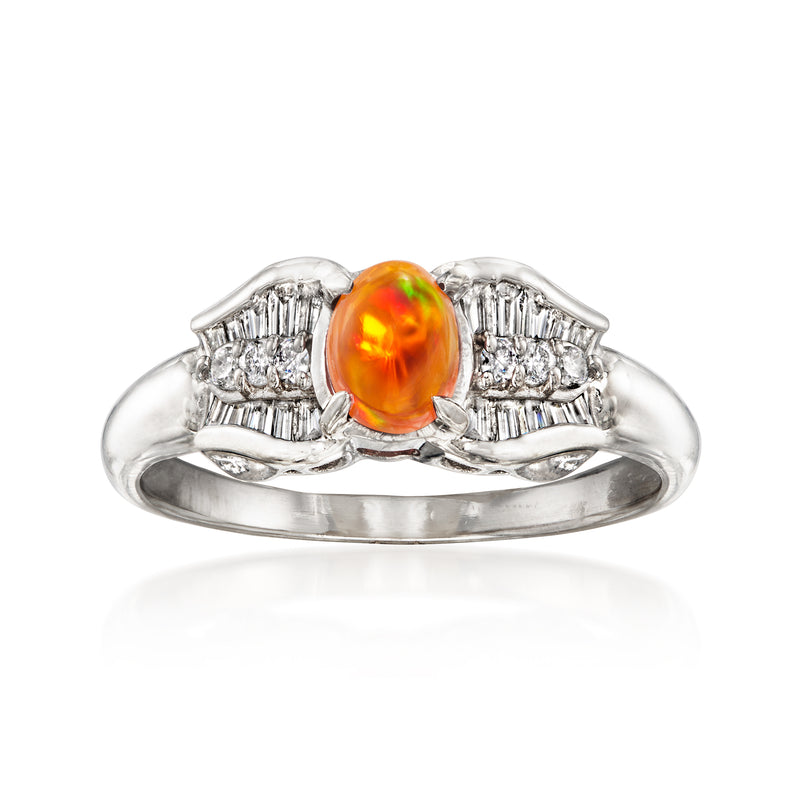 Platinum fire opal ring with oval orange opal center and baguette diamond sides