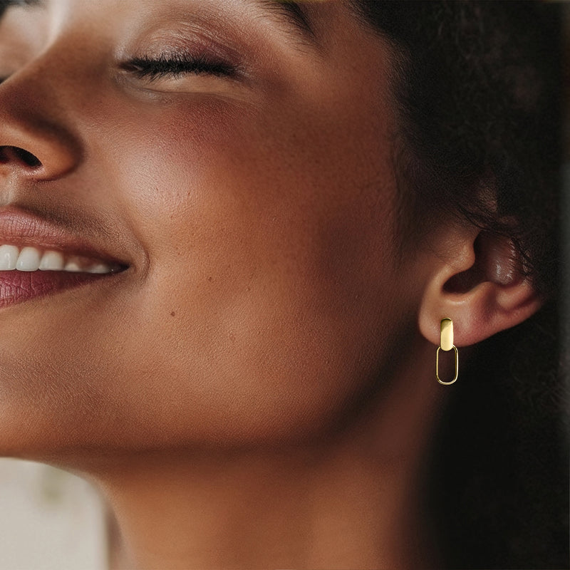 10kt yellow gold paperclip link hoop drop earring on ear, small oval hoops