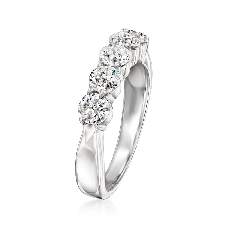 Five-stone diamond ring side view with round stones in white gold prongs