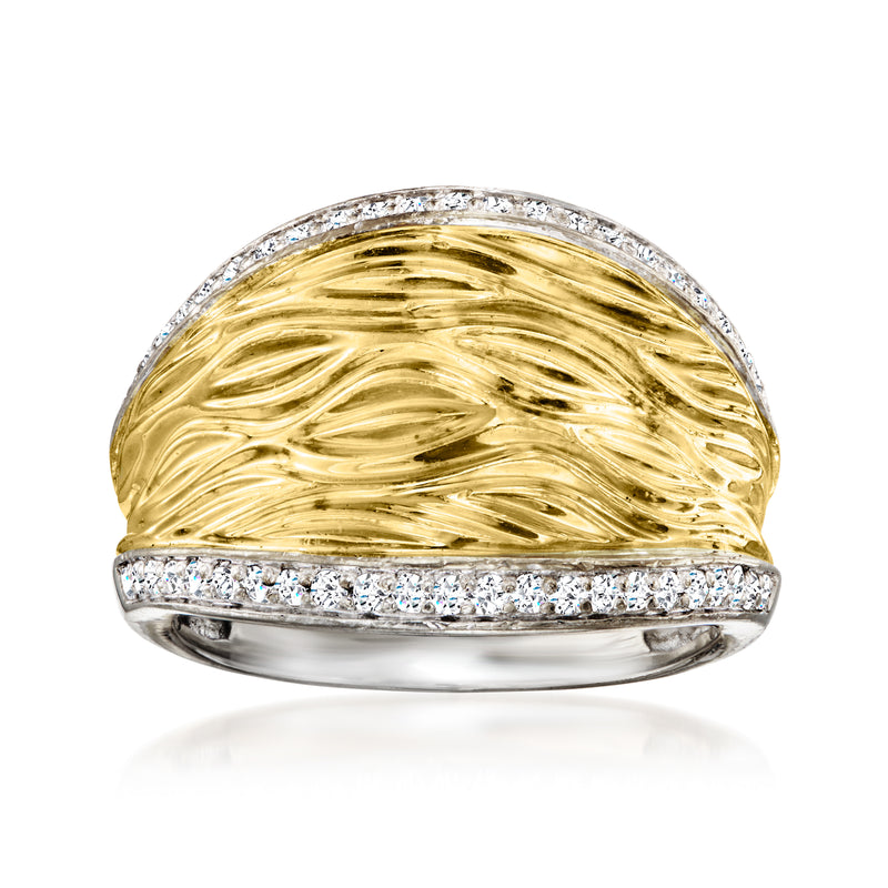 Wavy 18kt yellow gold diamond ring with pave-set stones across the top band