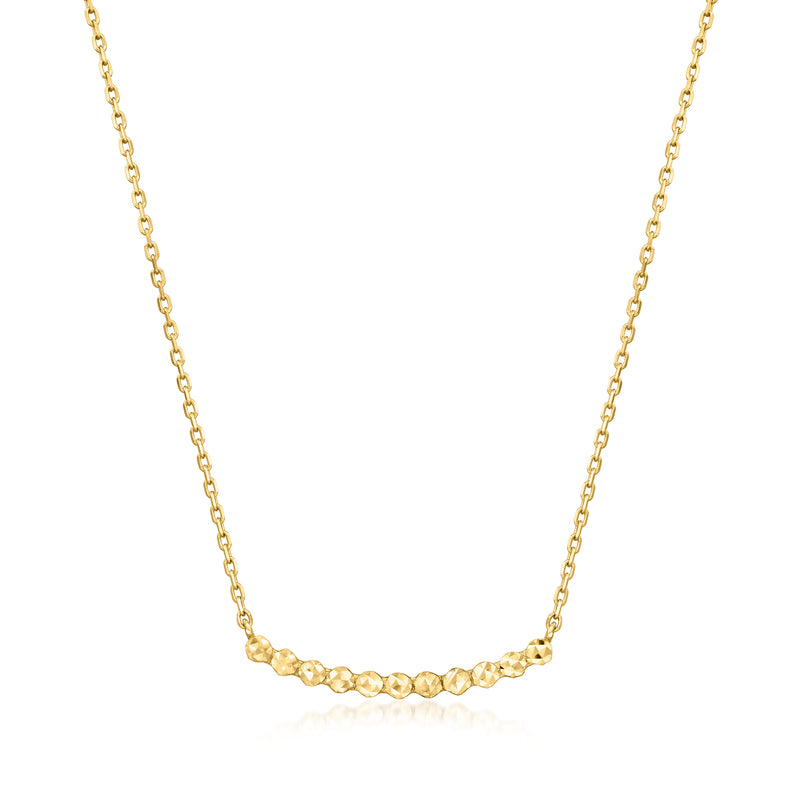 Yellow gold beaded station cable-chain necklace, small rounded links on cable chain.