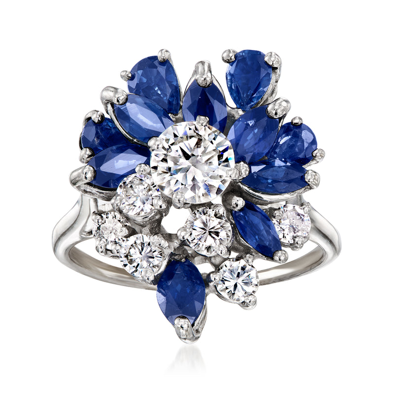 Vintage cluster ring in 14kt white gold with blue sapphires and diamond stones