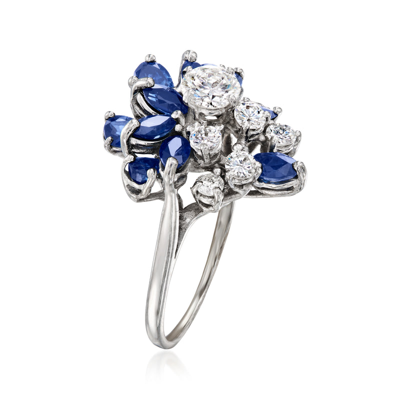 Open-top cluster ring in 14kt white gold with blue sapphires and diamond accents
