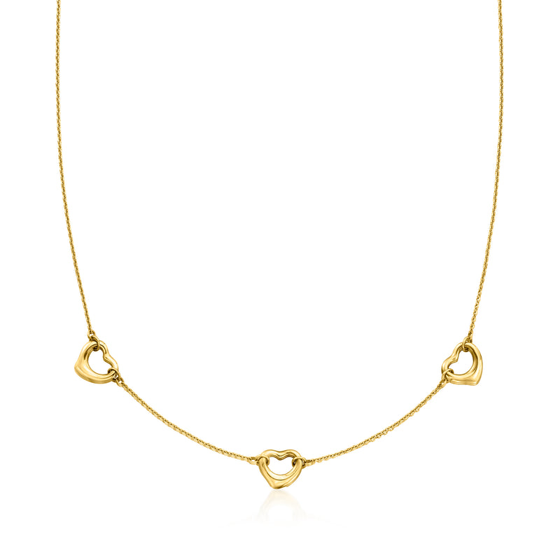 18kt yellow gold heart station necklace with small heart links on a fine chain