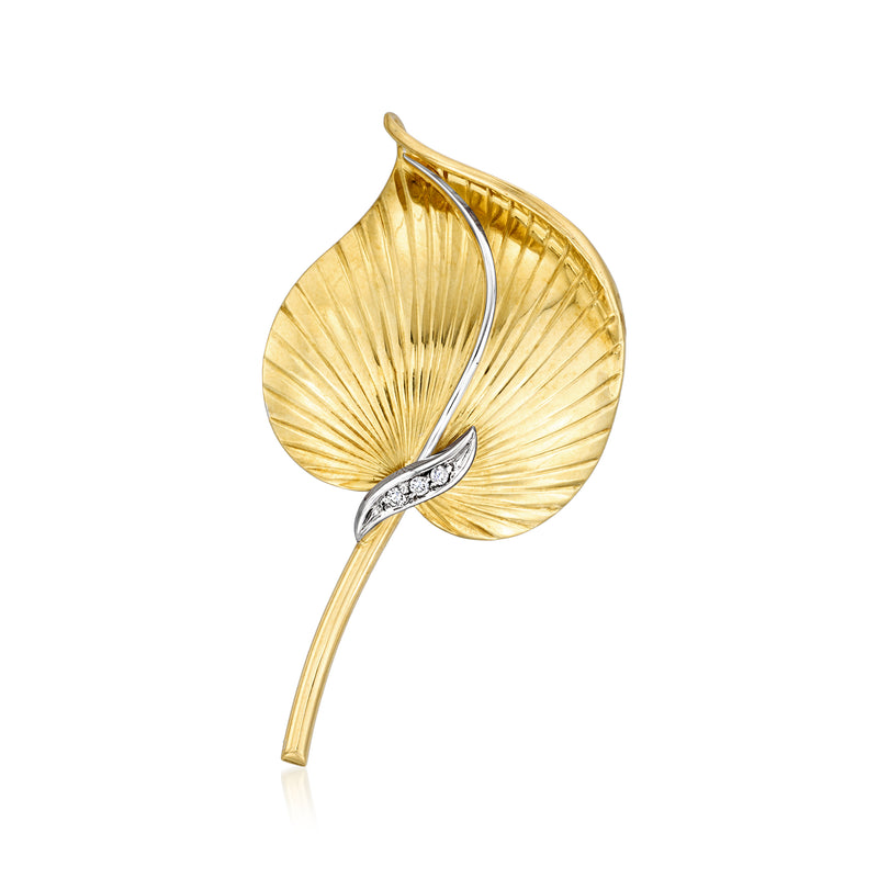 Two-tone gold leaf lapel pin with textured gold and silver-tone accents