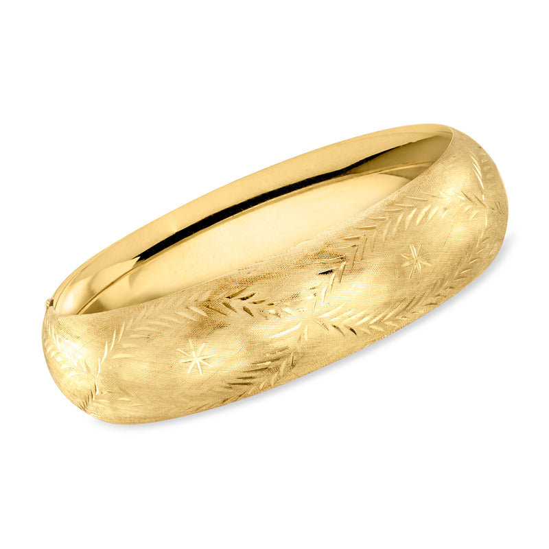 Vintage 14kt yellow gold etched bangle bracelet with carved leaf pattern