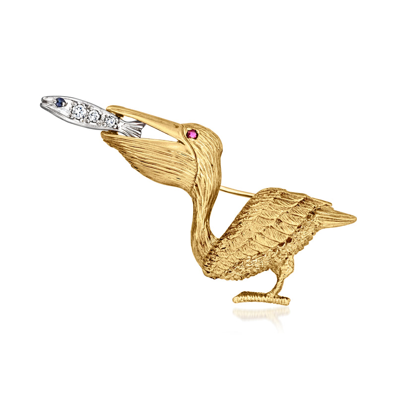 Two-tone gold pelican pin with sapphire blue, ruby red, and small diamonds