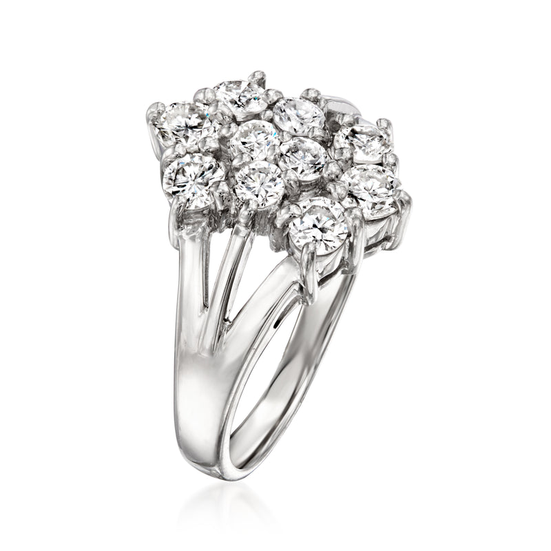 Platinum diamond cluster ring, angled view, prong-set round stones