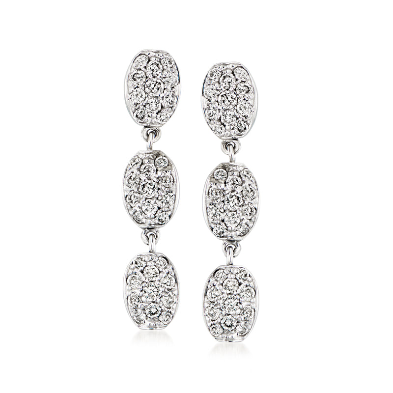 Vintage diamond drop earrings in 14kt white gold, oval three-stone design