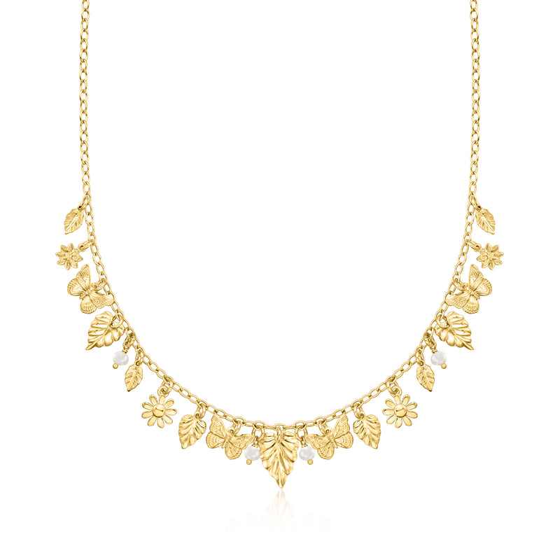 Gold charm necklace with floral leaves and small white pearls, spring-inspired