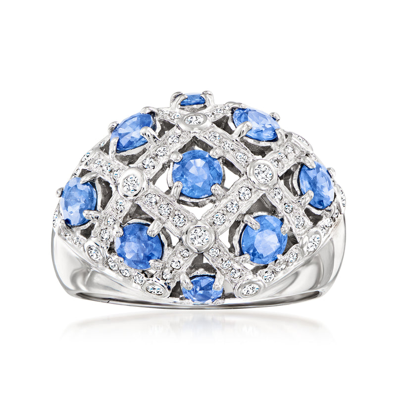 White gold dome ring with blue sapphires and diamond accents, cluster setting