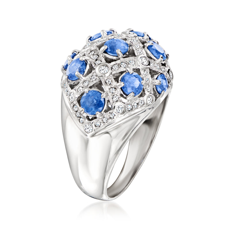 White gold ring with blue oval sapphires and round diamonds in ornate dome top