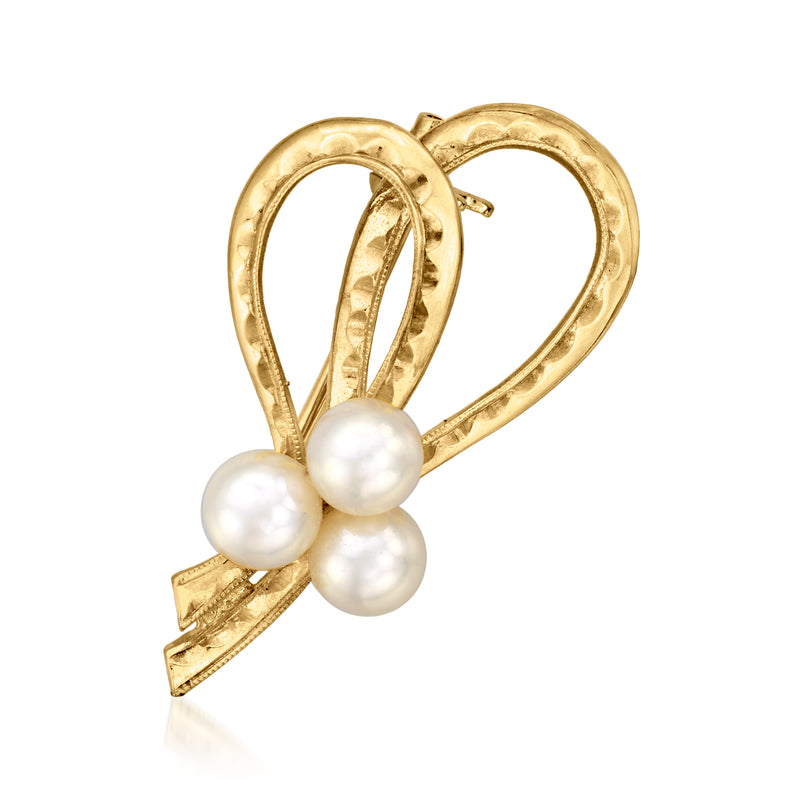 Vintage 18kt yellow gold bow pin with three white cultured pearls