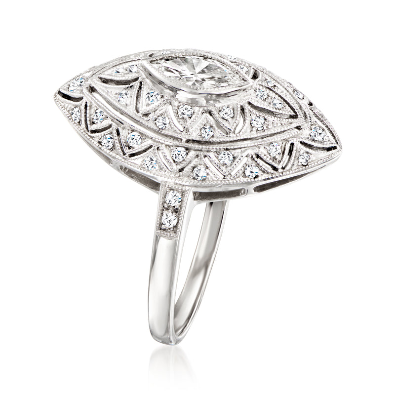 White gold filigree diamond ring, marquise top view with prong-set stones