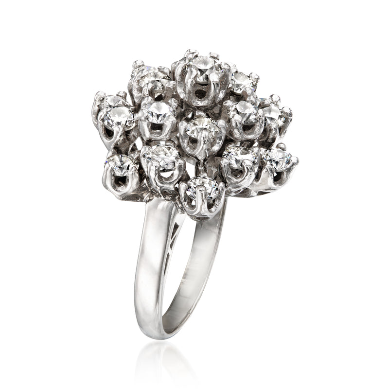 Vintage diamond cluster ring in 14kt white gold, side view of prong-set rounds