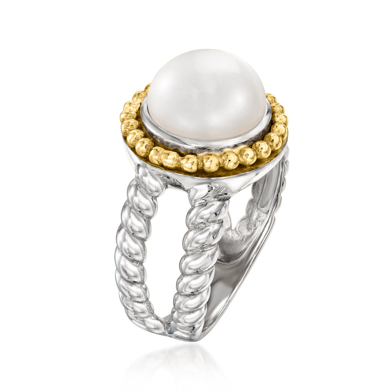 Cultured pearl ring with domed white pearl set in gold halo on twisted sterling silver band