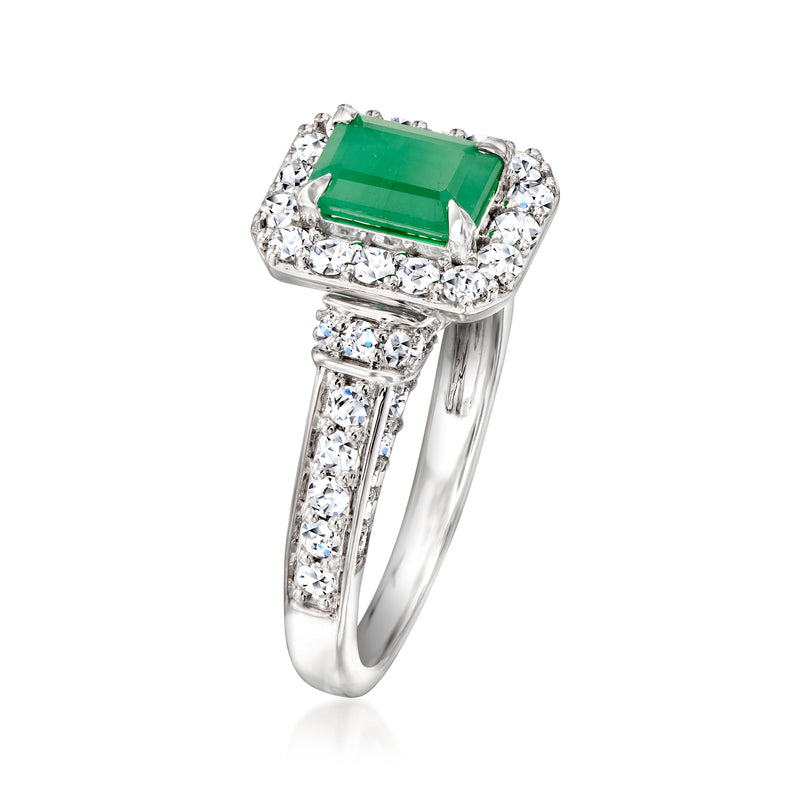 Sterling silver ring with square emerald-cut green gemstone and side diamond bands.