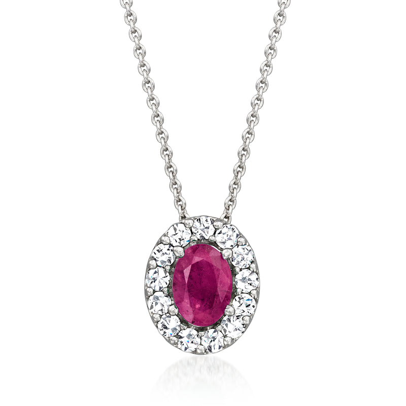 Sterling silver oval ruby pendant with diamond halo on a link chain necklace