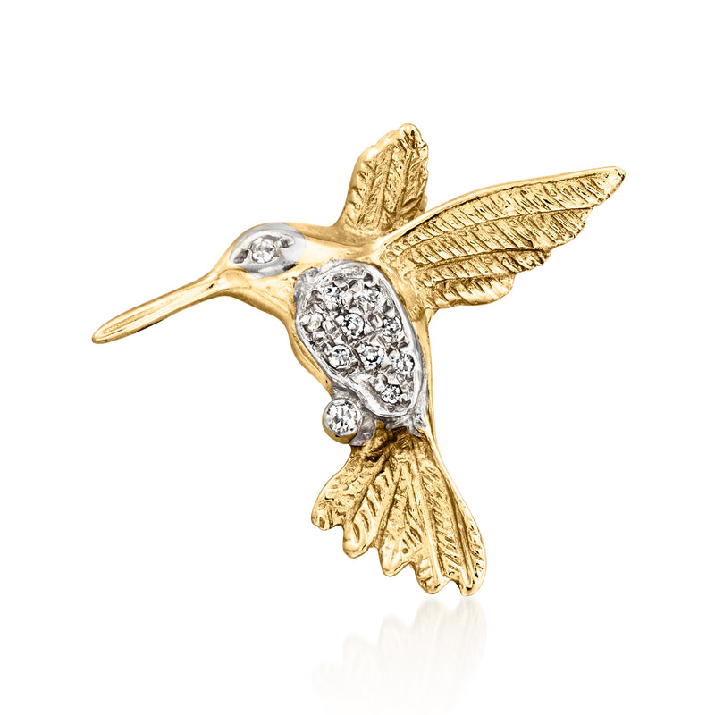 Hummingbird diamond pin in 14kt yellow gold, detailed wings with round stones.