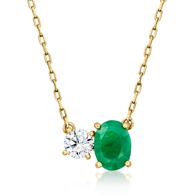 14kt yellow gold toi et moi necklace with round diamond and oval green emerald
