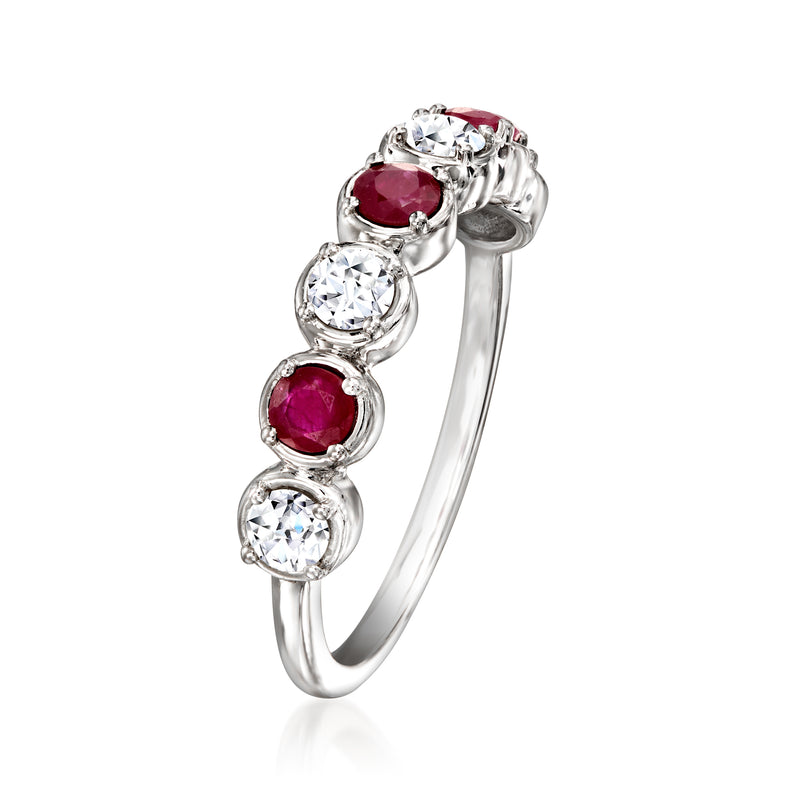 Sterling silver half-eternity ring with round ruby-red stones and clear diamonds