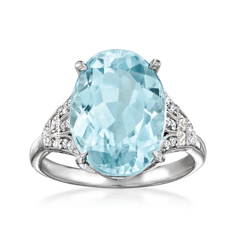 Platinum vintage aquamarine oval ring with diamond accents on the band