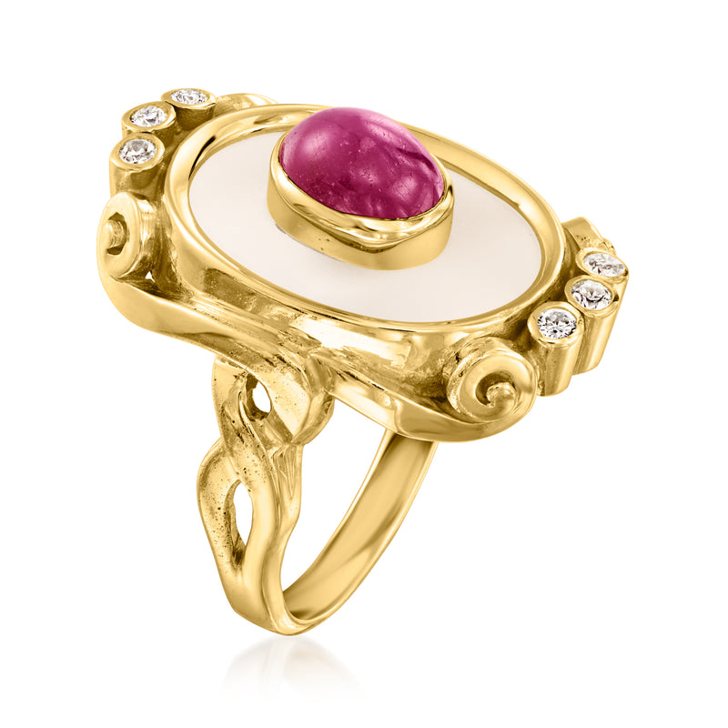 Yellow gold oval gemstone cocktail ring with bezel-set purple center and diamond border