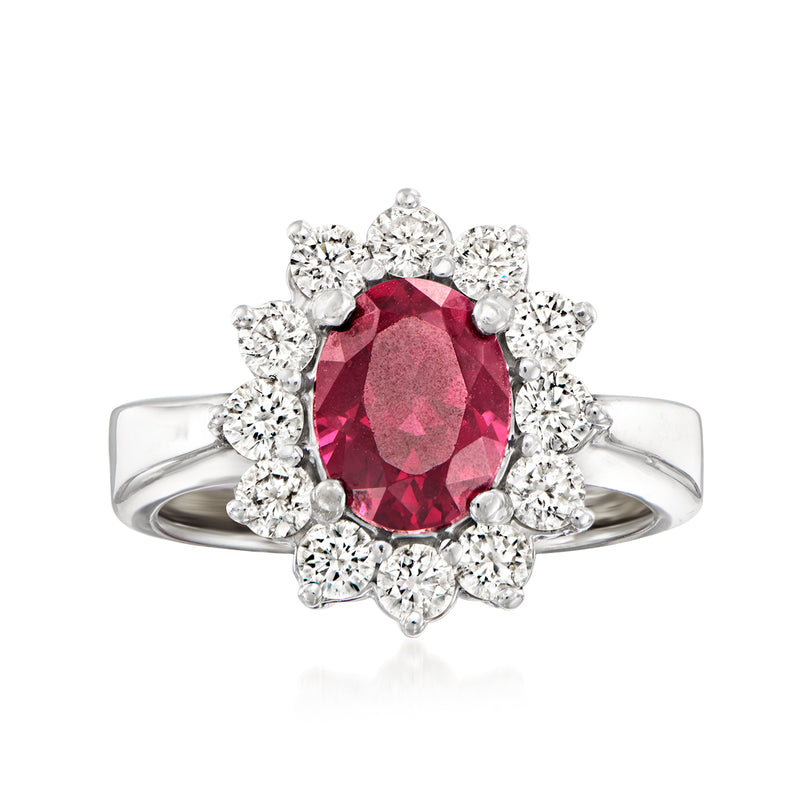 Oval rhodolite garnet halo ring in 14kt white gold with diamond accents