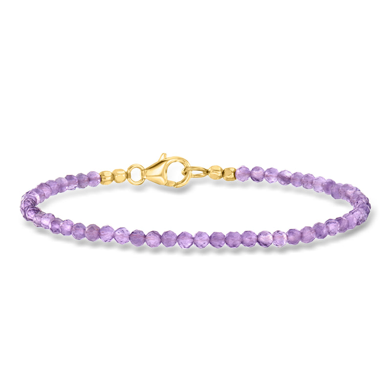 Purple amethyst bead bracelet with gold clasp and small gold beads