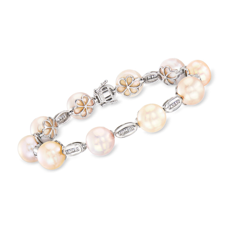 Vintage white gold bracelet with pink cultured pearls, floral links, and small clear stones