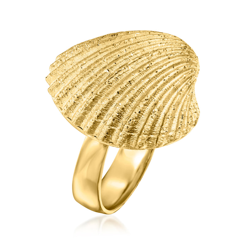 Gold seashell ring viewed from side, ridged shell face and shiny open band