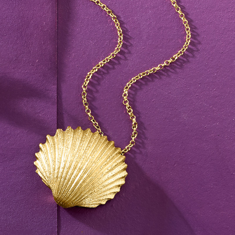 Gold seashell pendant necklace with large ribbed shell pendant and chain