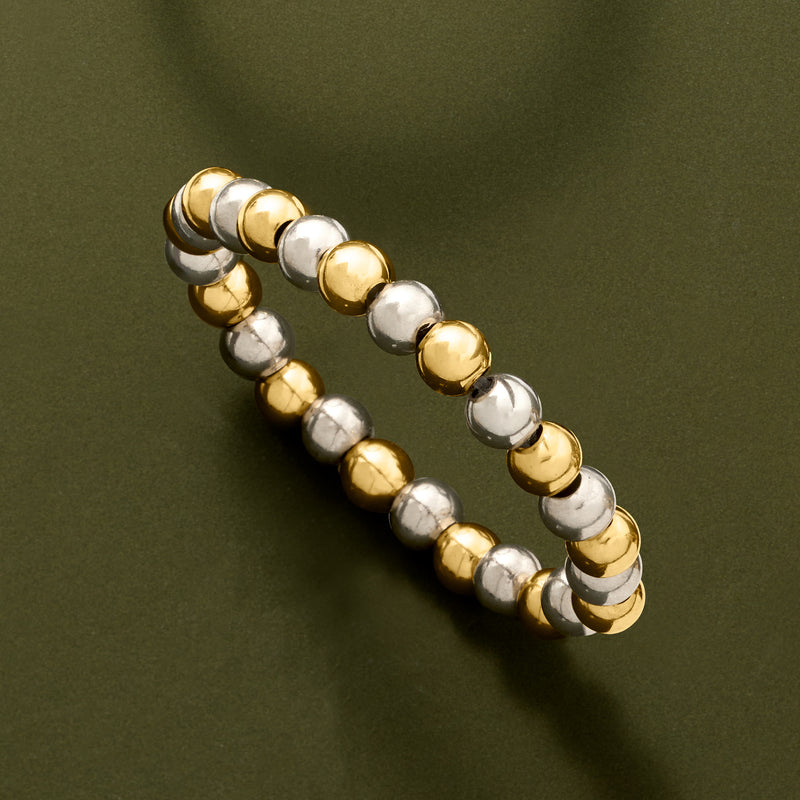 Sterling silver and 14kt yellow gold bead stretch ring with alternating round beads, angled