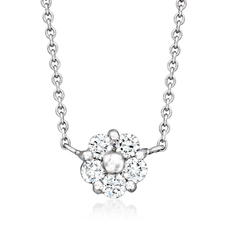 White gold diamond flower necklace with round brilliant stones and oval center