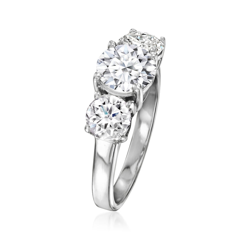 Platinum three-stone ring showing side profile with round lab-grown diamonds