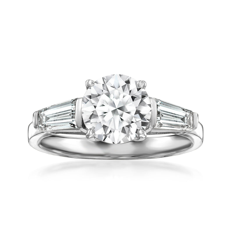 Platinum ring with round lab-grown diamond center and baguette side stones