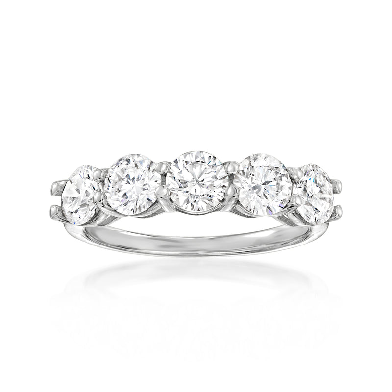 Platinum five-stone diamond ring with five round brilliant stones in shared prongs