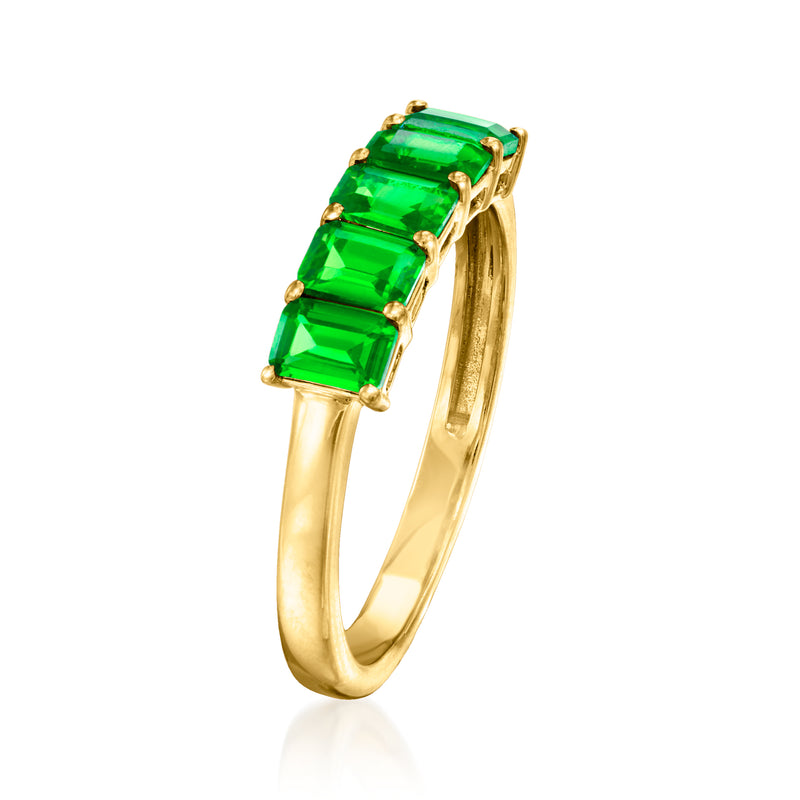Side view 18kt gold vermeil ring with three emerald-cut green stones